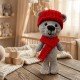 Osito de amigurumi color café/gris con gorro y bufanda roja tejida, fondo blanco y crema limpio, estilo nórdico y tierno.